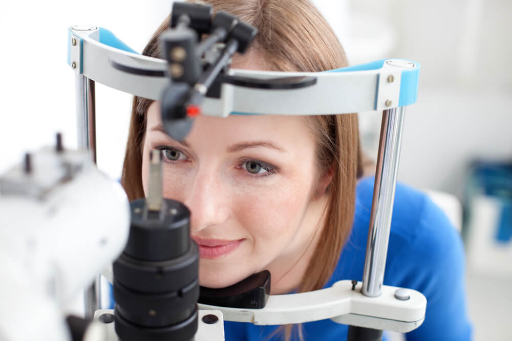 woman getting eye exam