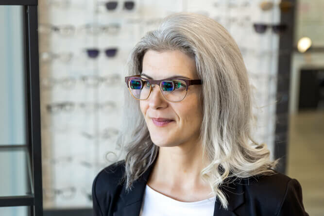 woman wearing glasses for low vision